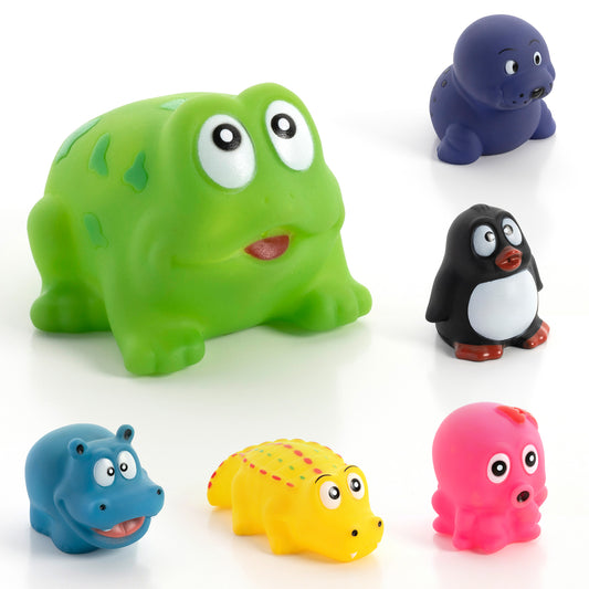3 Green Rubber Toy Frogs Stock Photo